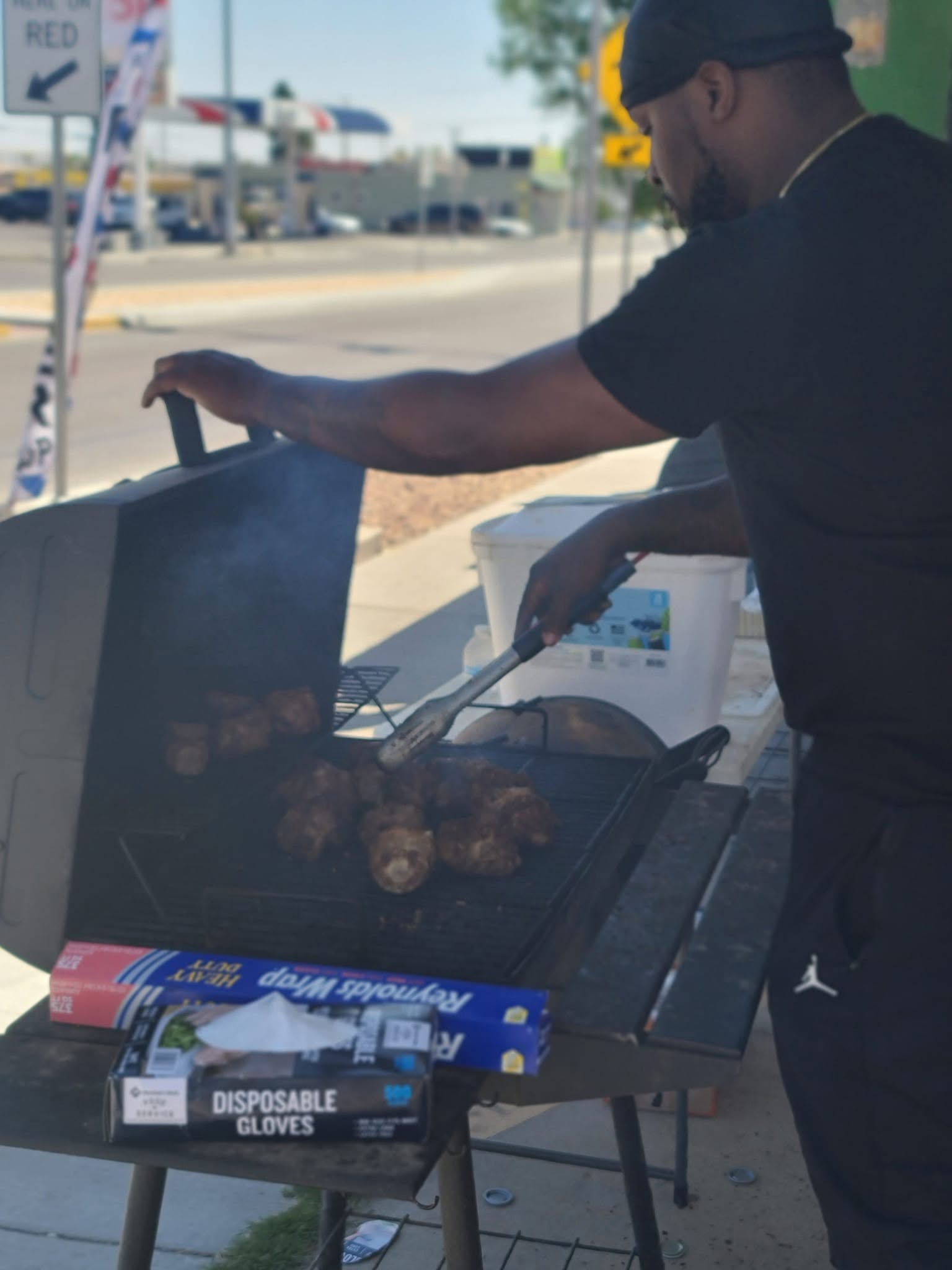 Owner tending the grill